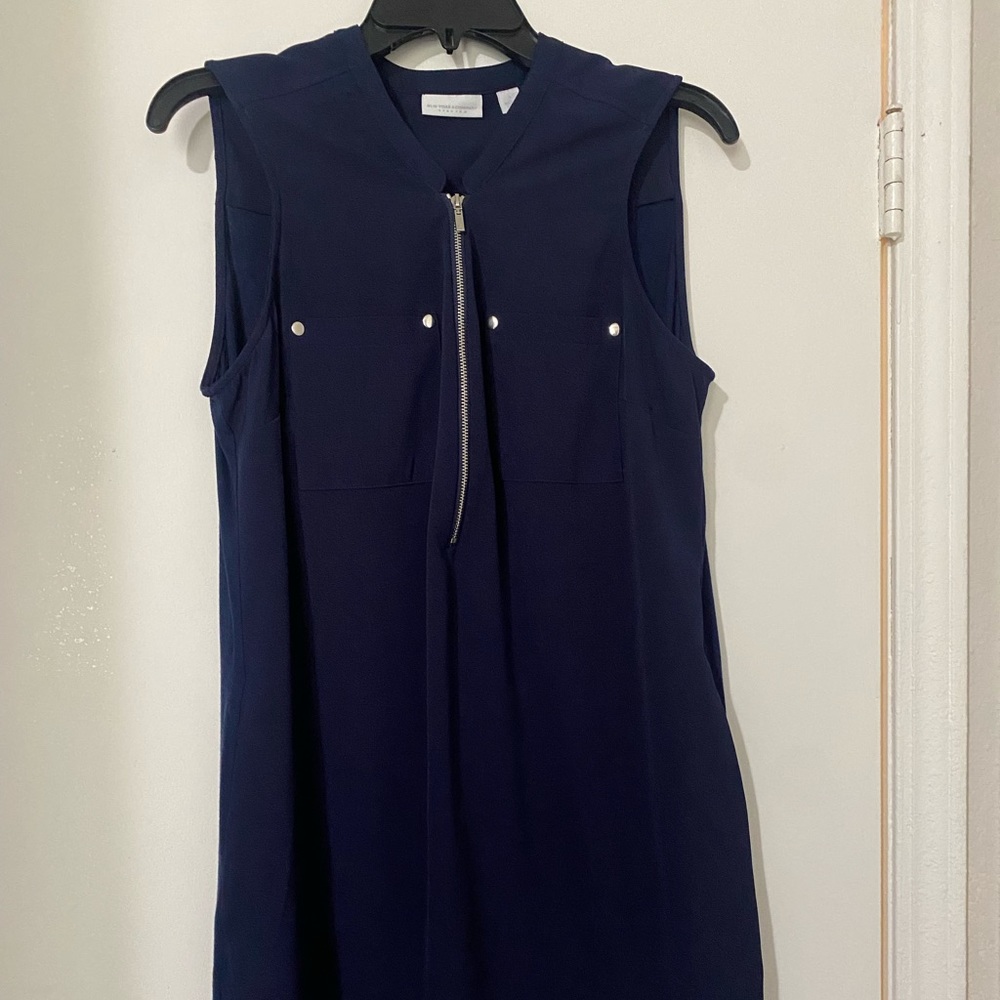 Navy blue dress from New York & Company. Goes slightly passed the knees.